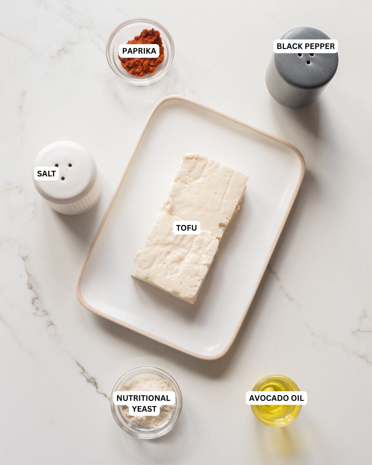 Overhead image of the ingredients of tofu croutons.