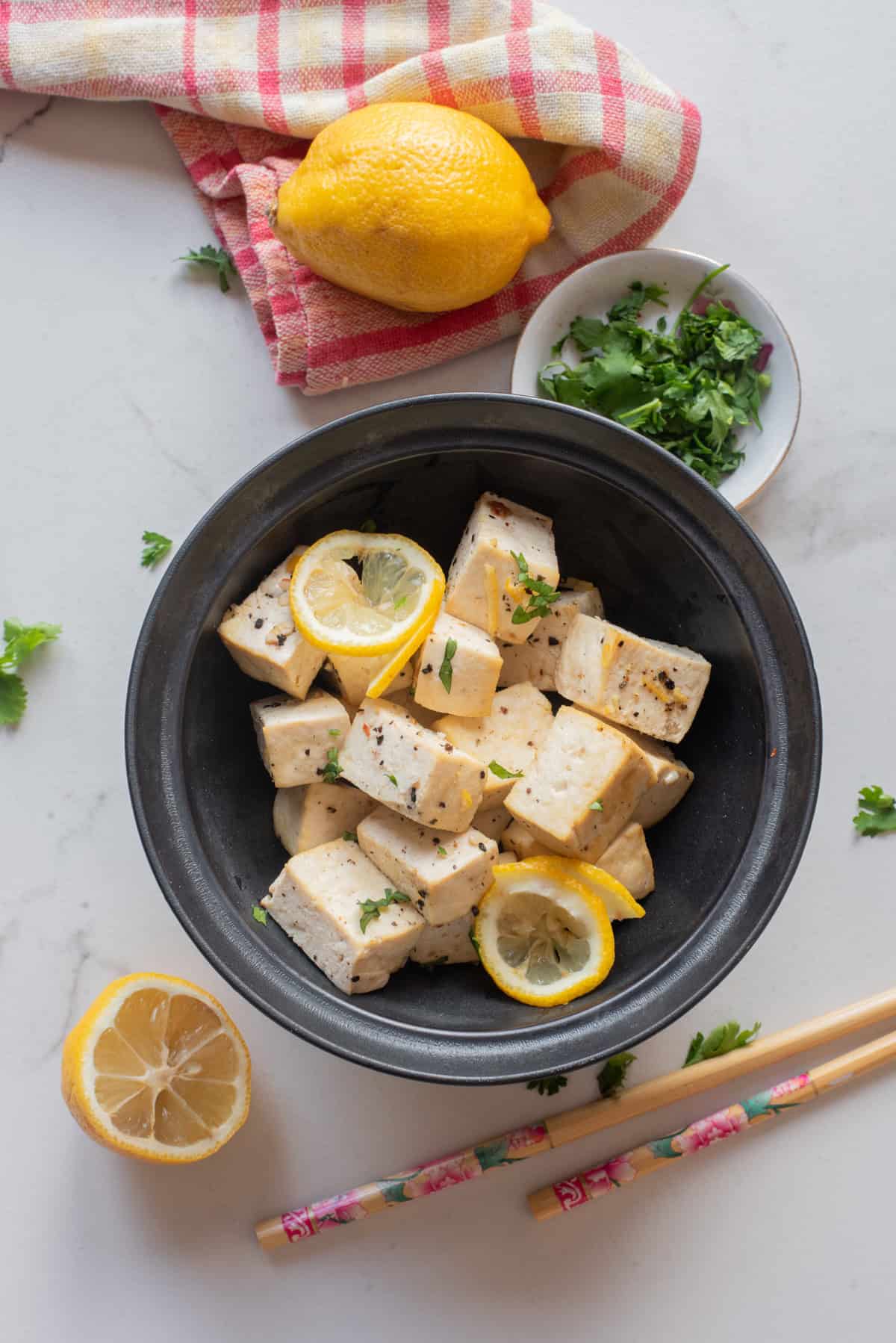 An overhead image of lemon pepper tofu served in a bowl.