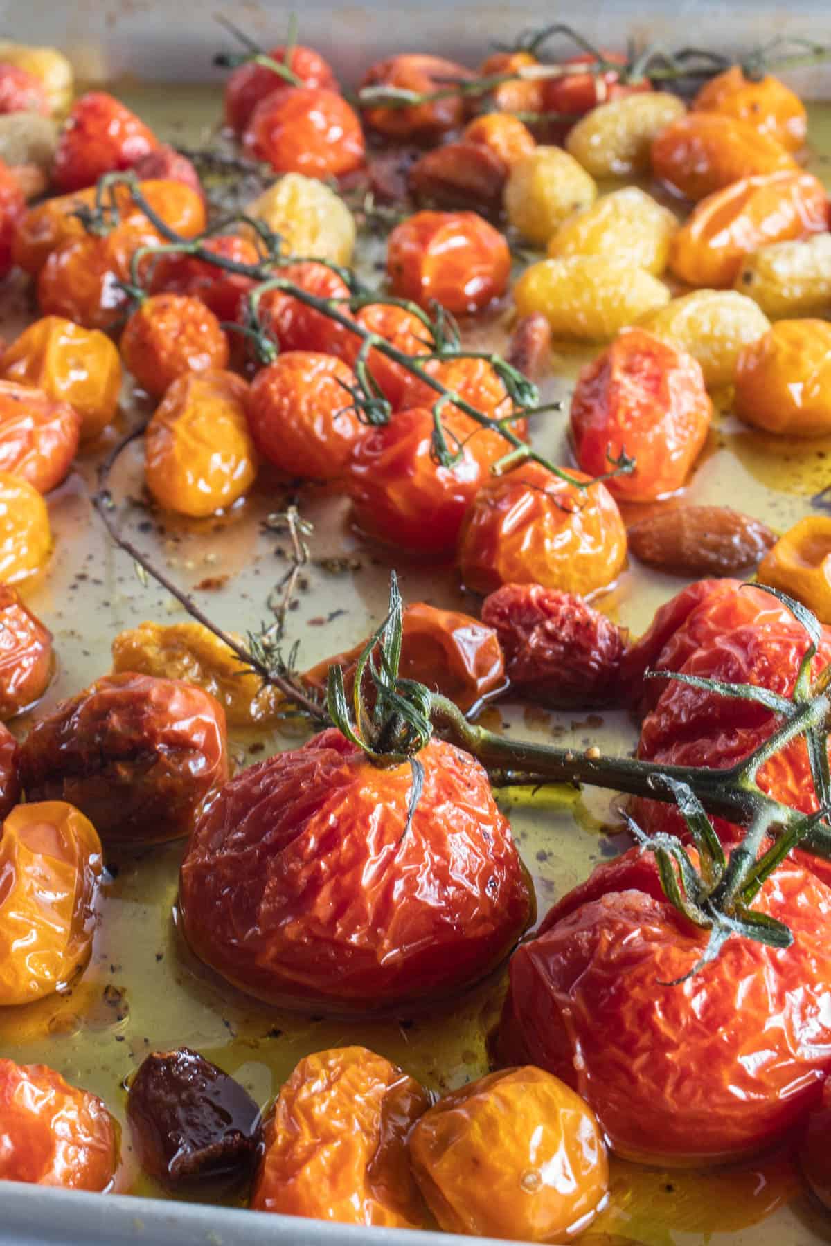 Close up image of tomato confit on baking sheet