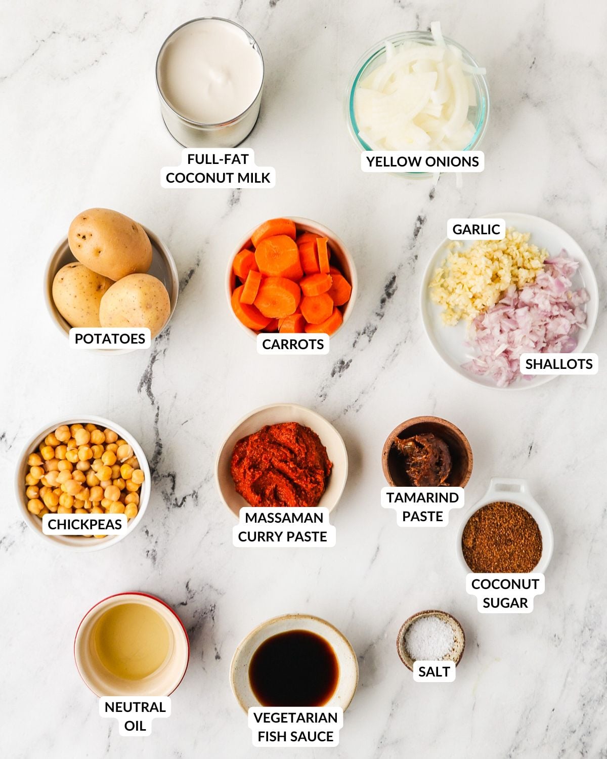 An overhead image of the ingredients of vegan massaman curry.