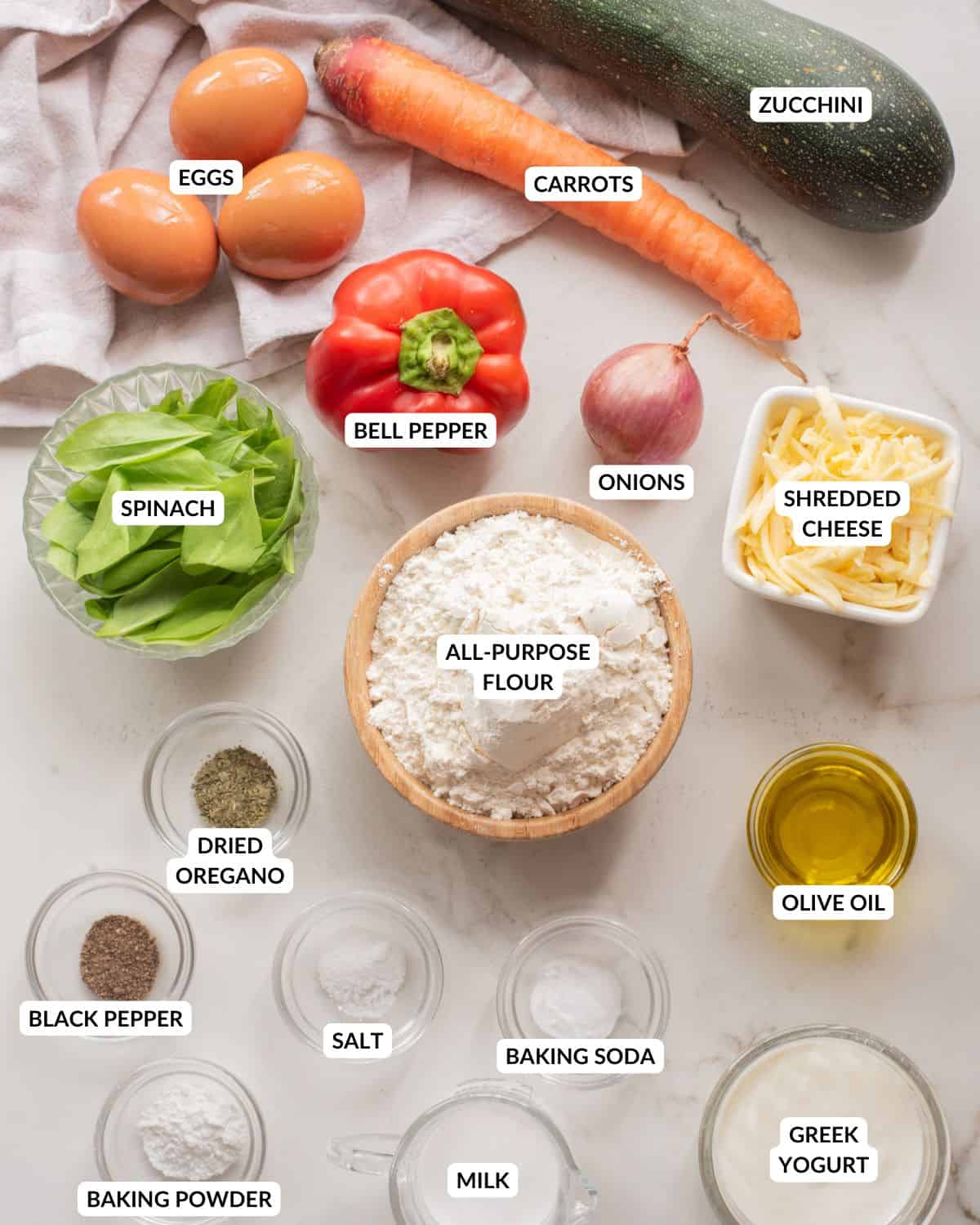 An overhead image of the ingredients of veggie muffins.