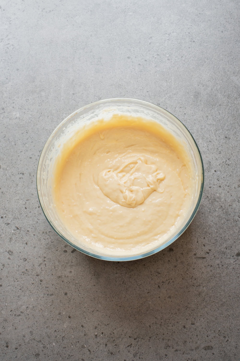 An overhead image of mixing the wet and dry mixture together.