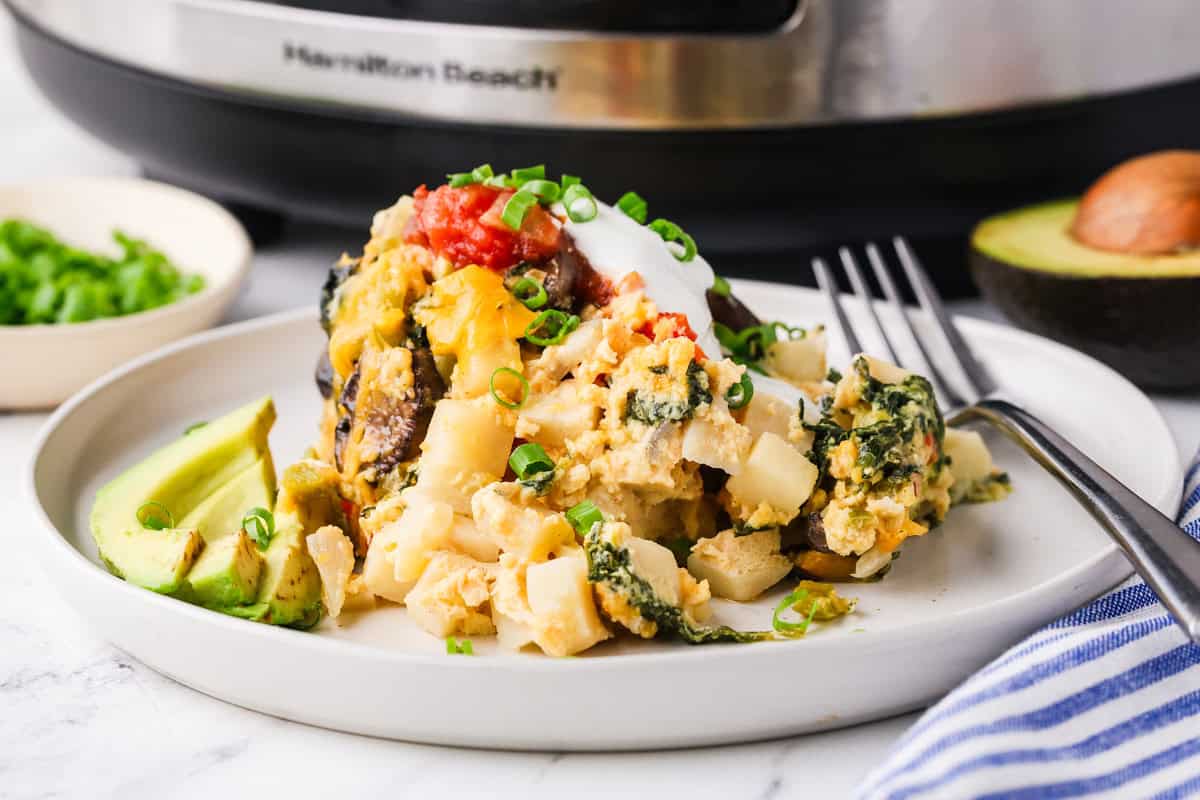 An image of vegetarian slow cooker casserole served on a plate.