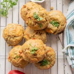 An overhead image of veggie muffins on a wire rack.