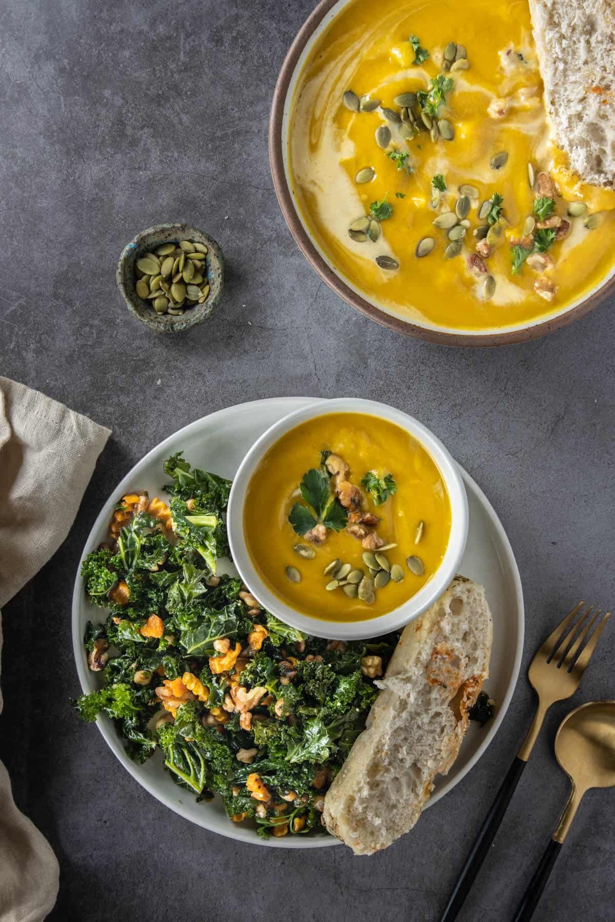 Picture of pumpkin soup with salad and bread