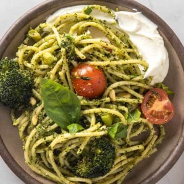 Broccoli pesto pasta with cherry tomatoes and whipped ricotta