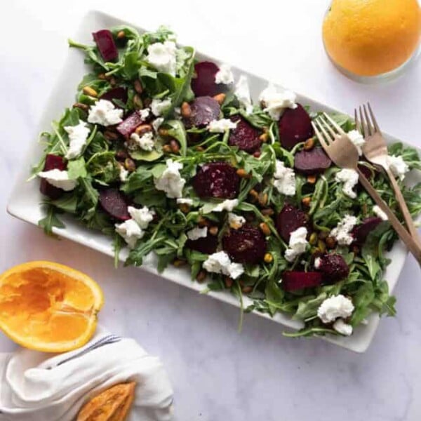 Platter with roasted beets, arugula, goat cheese and pistachios