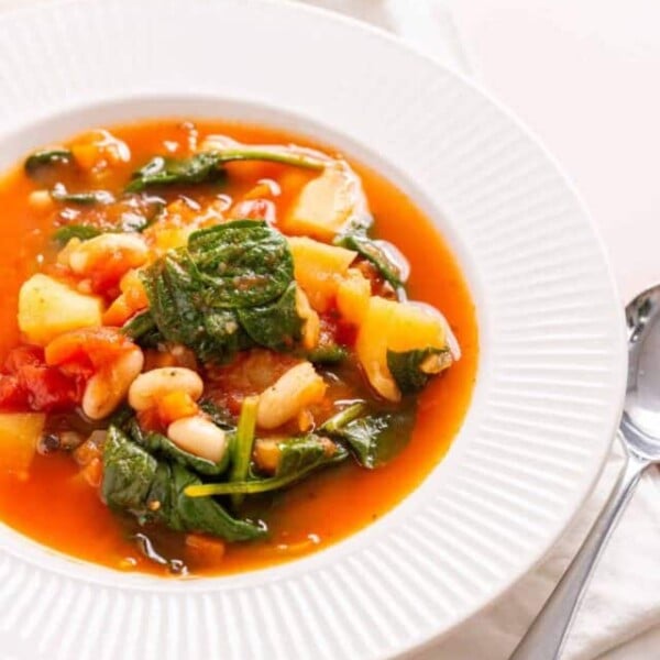An overhead image of instant pot minestrone in a bowl.