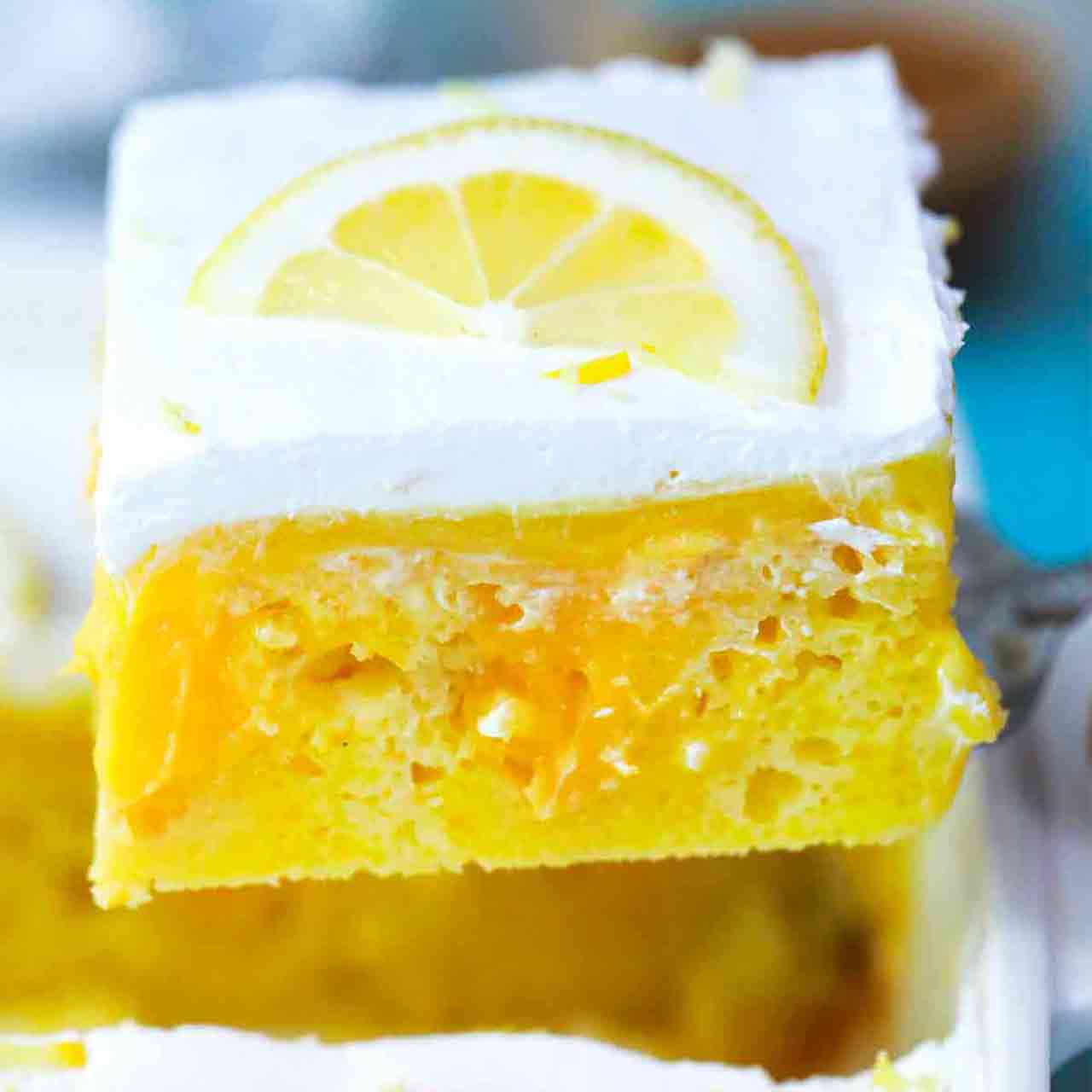 A close-up view of lemon poke cake.